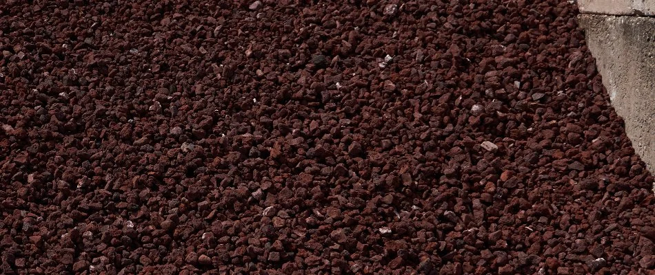 Large pile of red lava rocks in Orlando, FL.